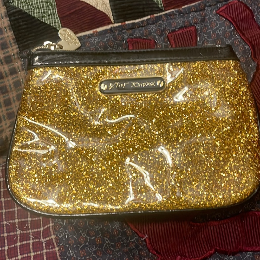 Betsy Johnson gold and black clutch